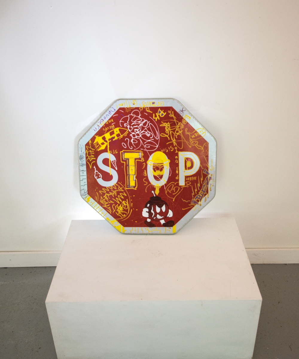 Graffiti Covered French STOP sign